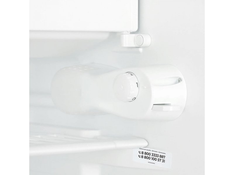 Indesit TT 85 A ручка механического терморегулятора и боковой профиль корпуса