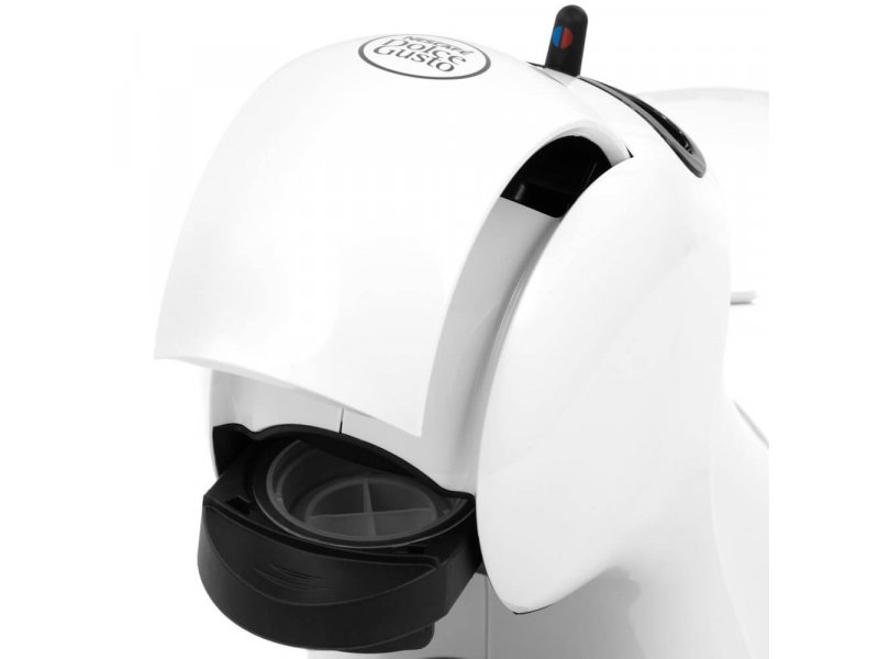De Longhi Dolce Gusto EDG 110.WB белый на кухонной столешнице рядом с чашкой эспрессо