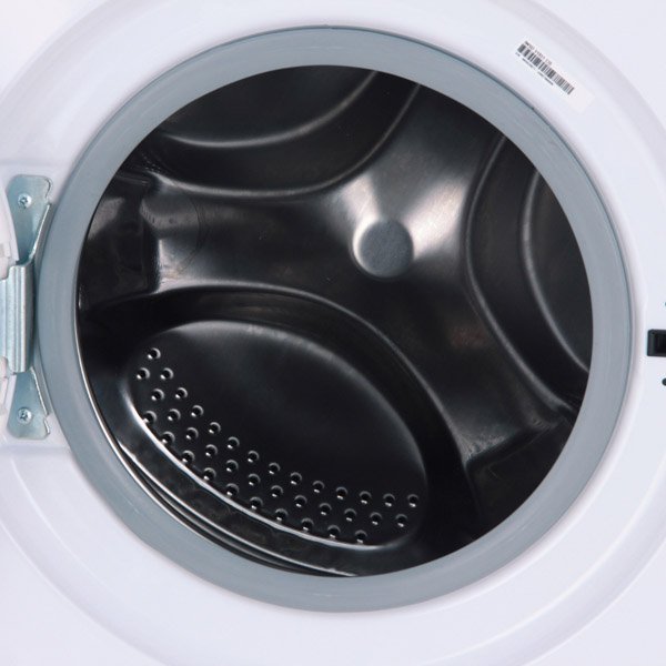 Indesit IWSD 51051 CIS внутренняя поверхность барабана с перфорацией — вид через открытый люк