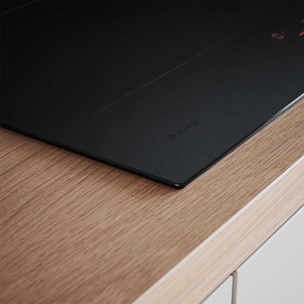 Asko HI2642FMG1 — зоны нагрева и интерфейс SliderTouch крупным планом