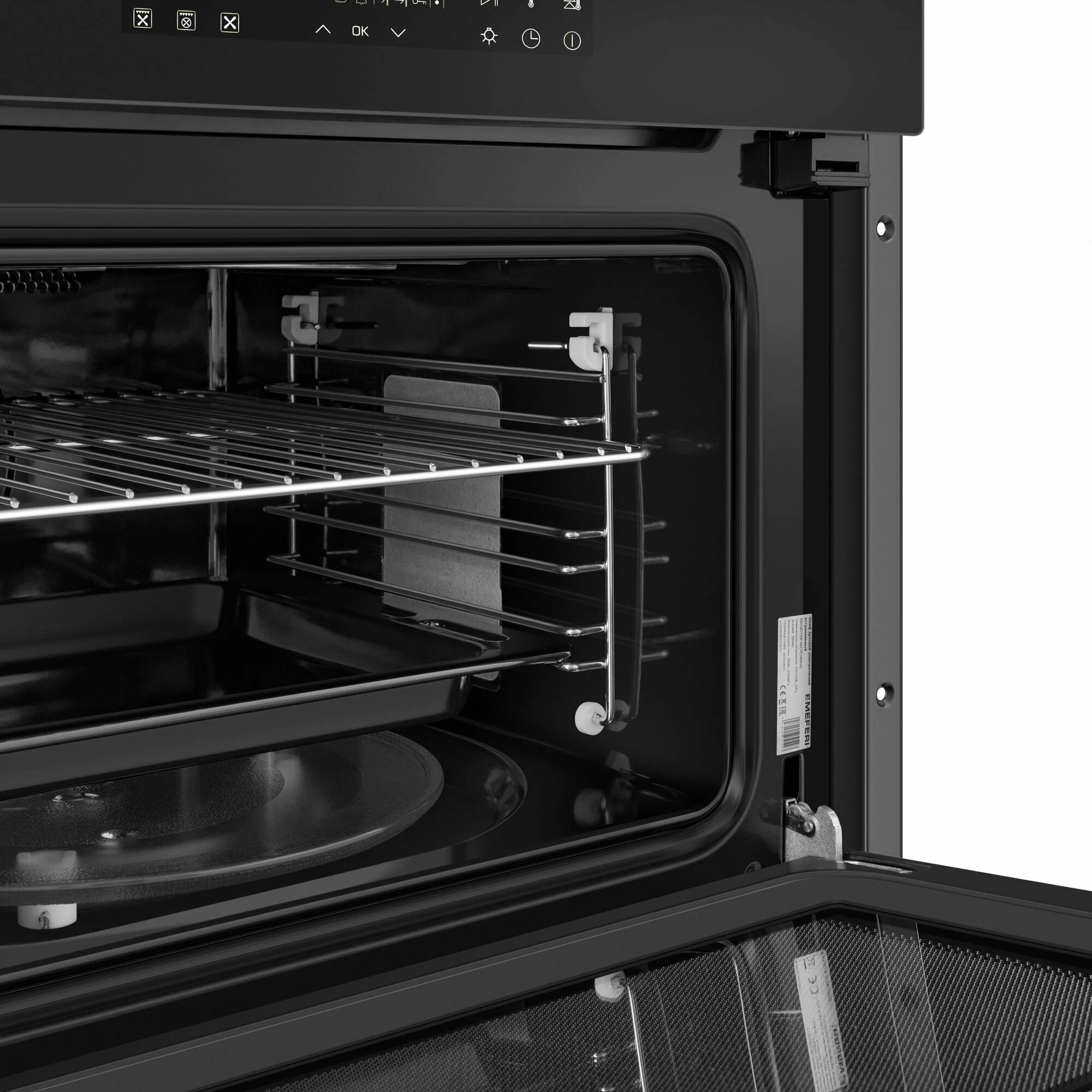 Meferi MEO609BK внутренний вид камеры с решёткой и поворотным столом для режима СВЧ